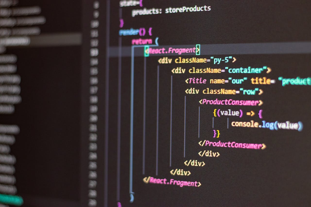 services-05 Close-up of HTML and JavaScript code on a computer screen in Visual Studio Code.