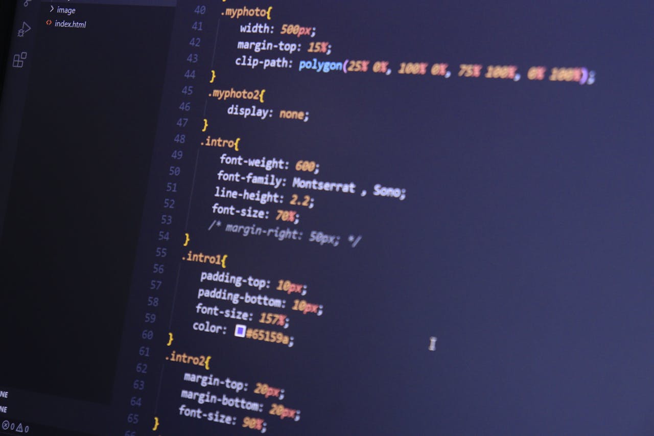 services-06 Focused shot of HTML and CSS code on a monitor for web development.