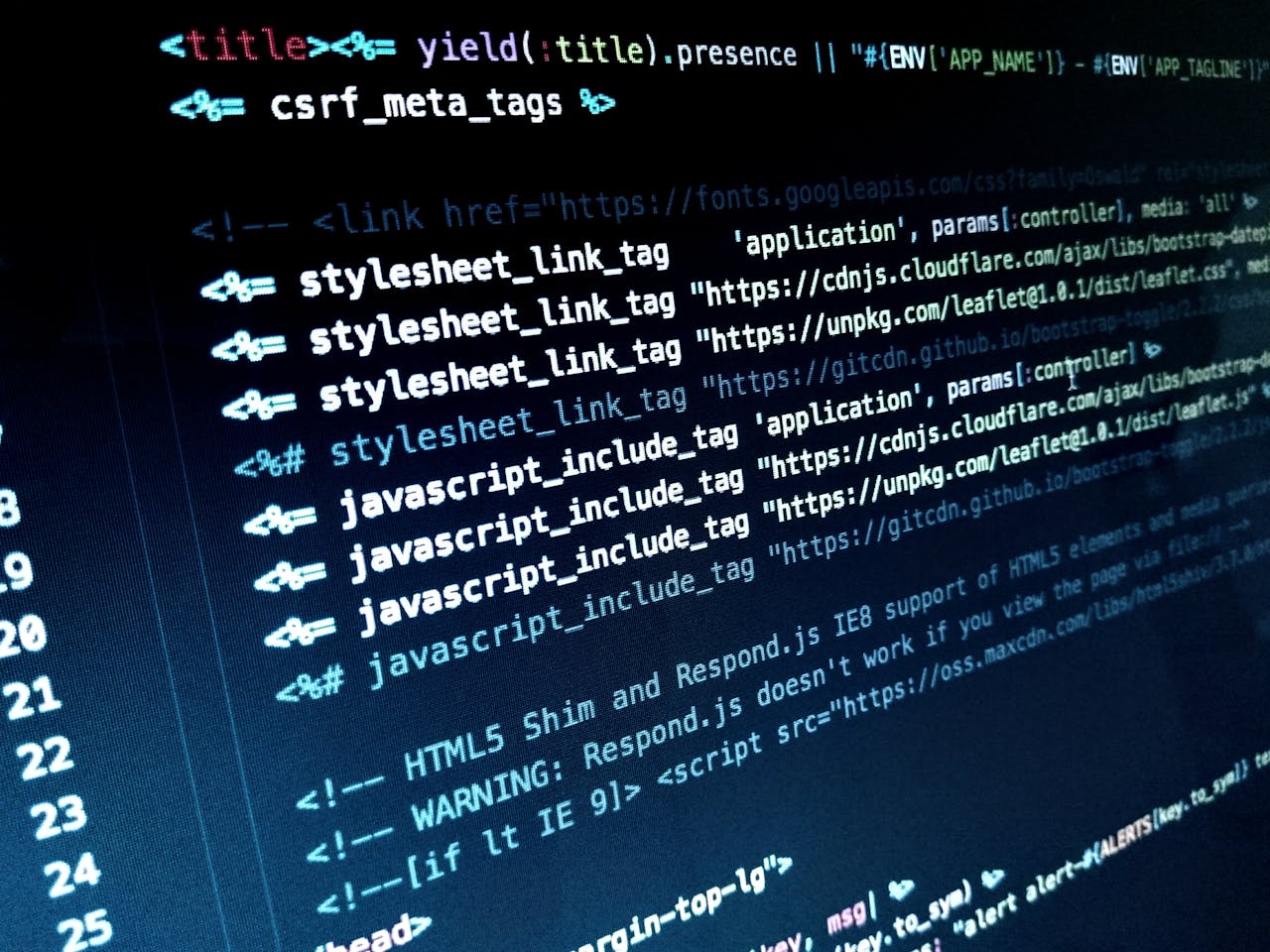 about-us Detailed view of HTML and JavaScript code displayed on a computer monitor.